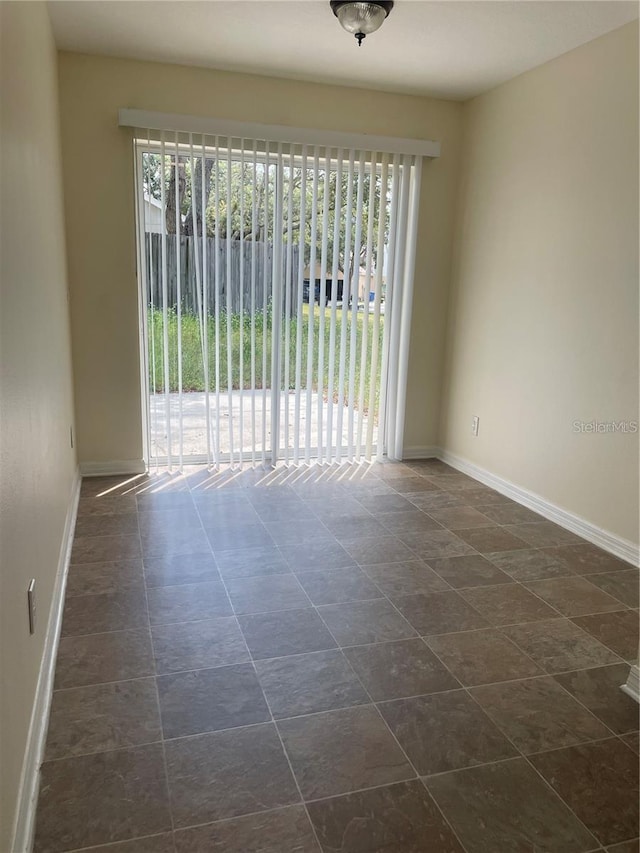 view of tiled spare room