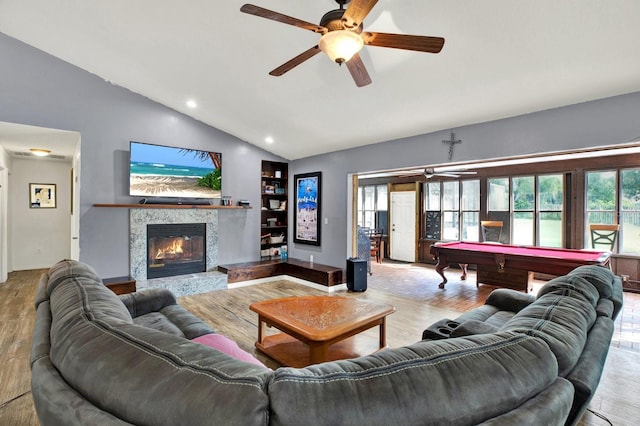 living room featuring ceiling fan, light hardwood / wood-style flooring, lofted ceiling, and pool table