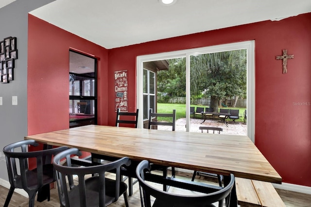 dining room with light hardwood / wood-style flooring