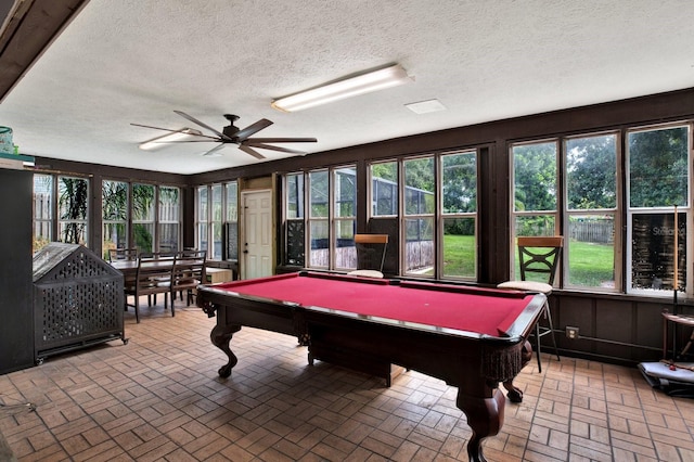 rec room featuring ceiling fan, a textured ceiling, and billiards