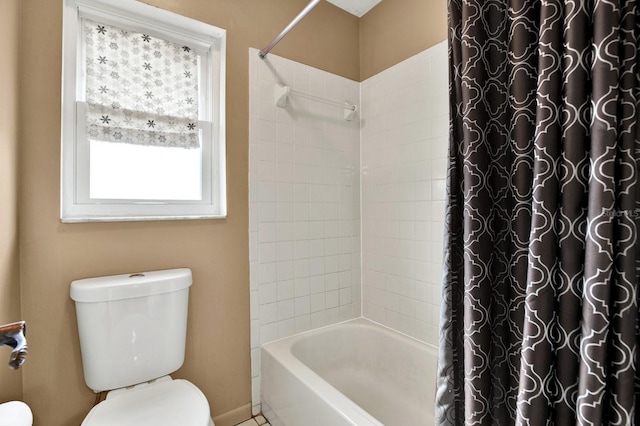 bathroom with toilet and shower / bathtub combination with curtain