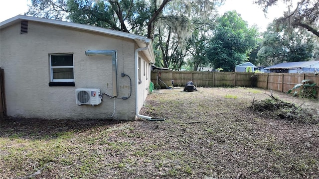 view of yard featuring ac unit