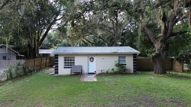 view of outdoor structure with a yard