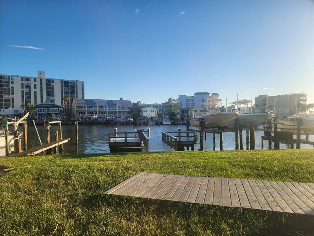 dock area with a water view