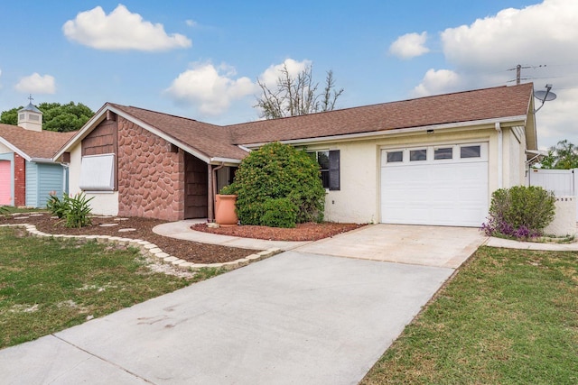 single story home with a front lawn and a garage