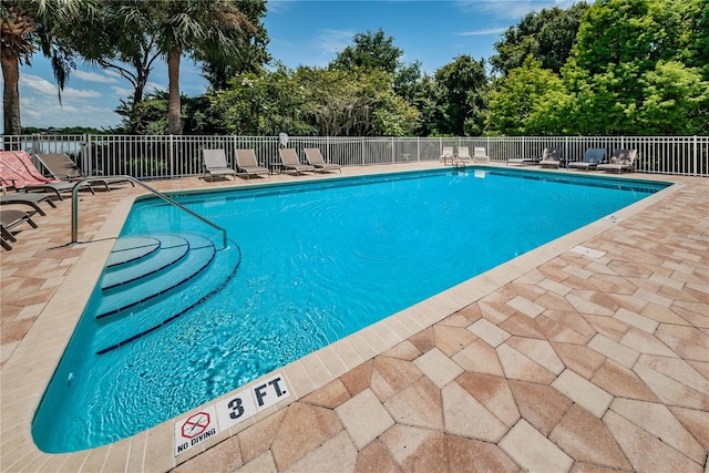 view of pool with a patio area