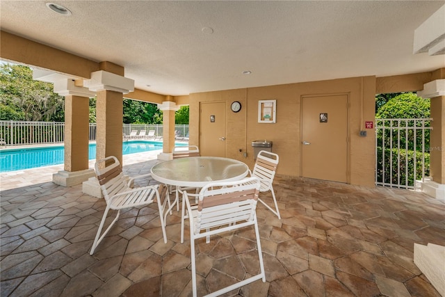 view of patio / terrace with a community pool