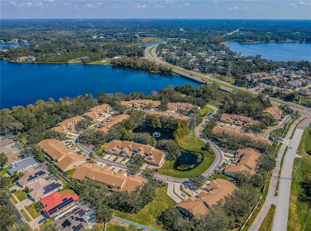 drone / aerial view with a water view