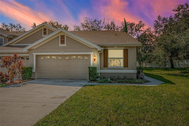 view of front of house with a yard