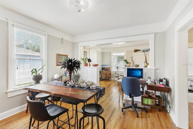 dining space featuring light hardwood / wood-style floors