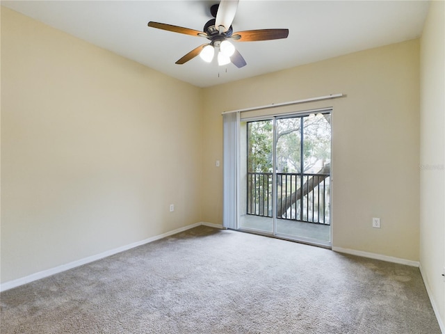 carpeted empty room with ceiling fan