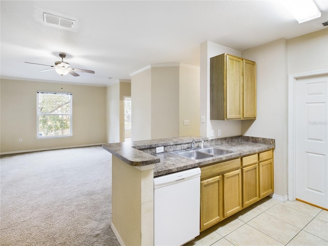 kitchen with dishwasher, sink, ceiling fan, light colored carpet, and kitchen peninsula