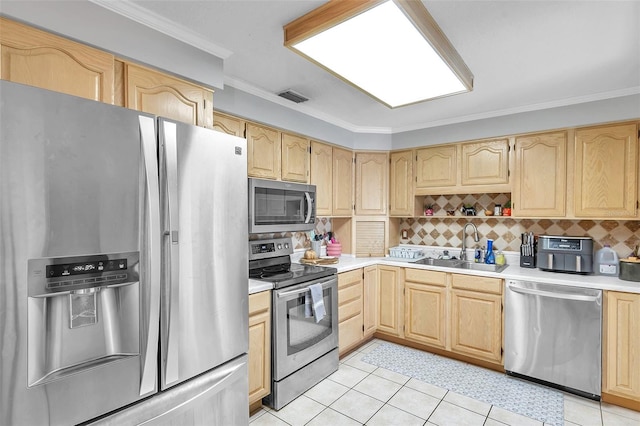 kitchen with sink, crown molding, appliances with stainless steel finishes, and light brown cabinetry