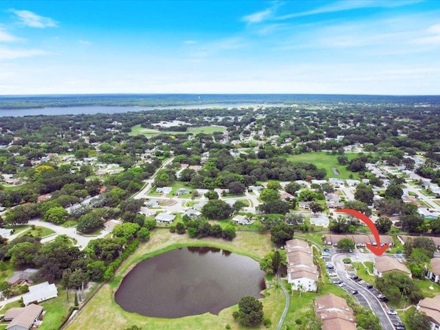 drone / aerial view featuring a water view