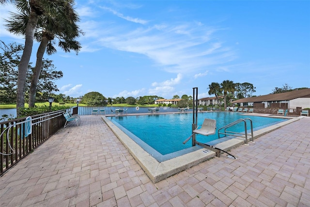 view of swimming pool with a patio area