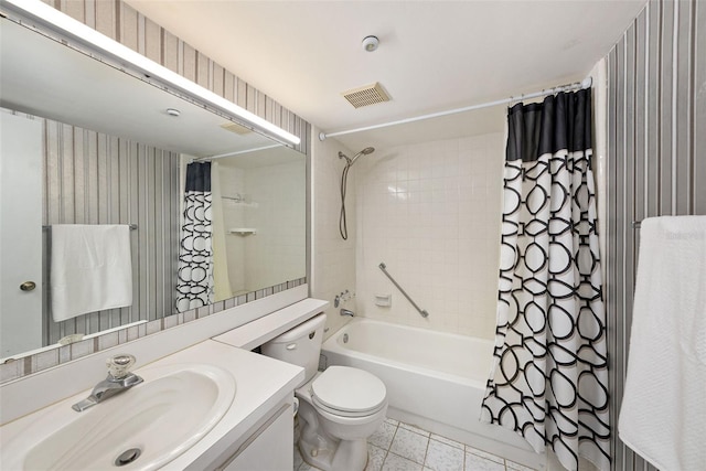 full bathroom featuring shower / bath combo, vanity, tile patterned floors, and toilet