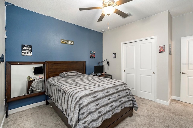 carpeted bedroom with ceiling fan