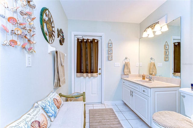 bathroom featuring vanity, toilet, and tile patterned floors