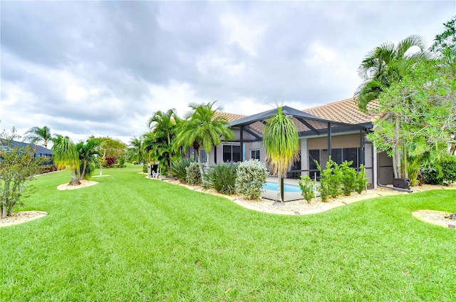 view of yard featuring a lanai