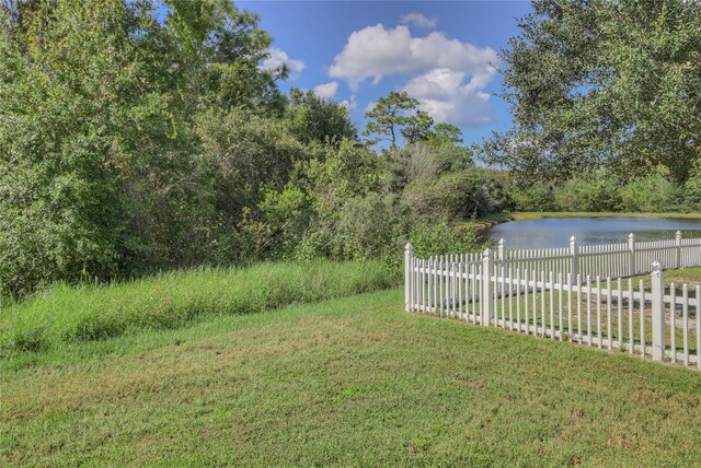 view of yard with a water view