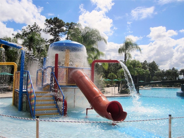 view of playground featuring pool water feature