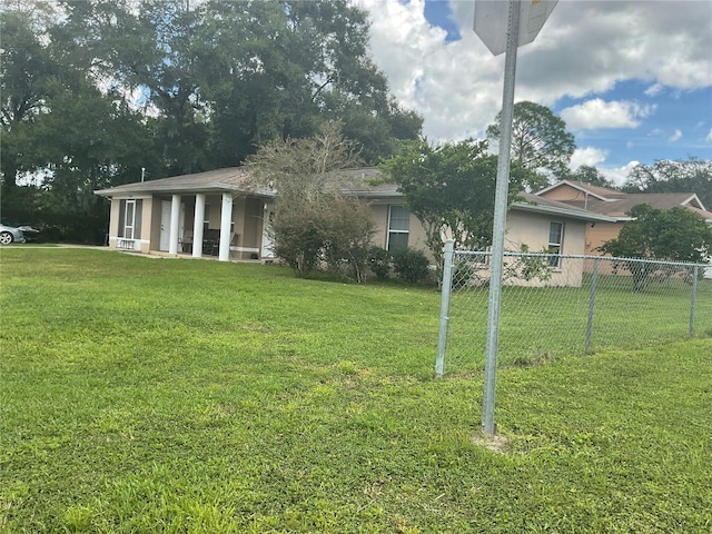 view of front of property with a front lawn