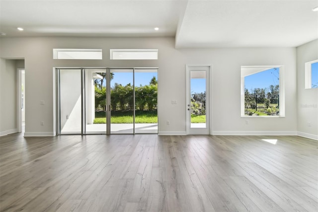 spare room featuring hardwood / wood-style flooring