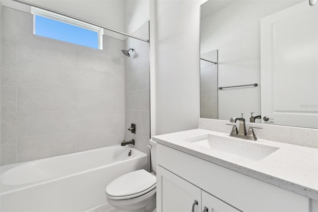 full bathroom featuring bathtub / shower combination, vanity, and toilet