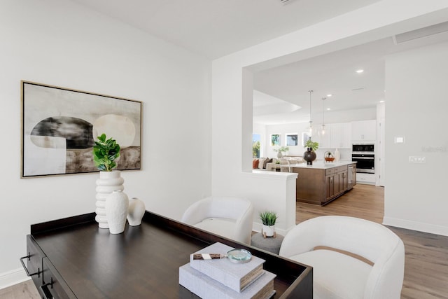 dining space featuring light hardwood / wood-style flooring