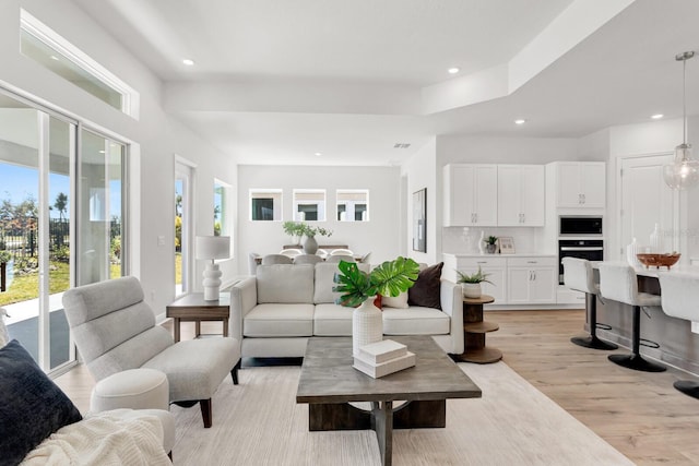 living room featuring light wood-type flooring