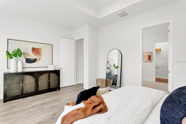 bedroom with light wood-type flooring