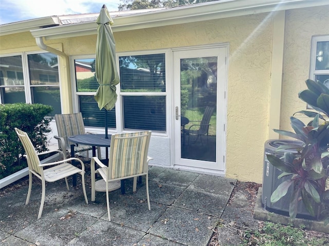 view of patio / terrace with cooling unit