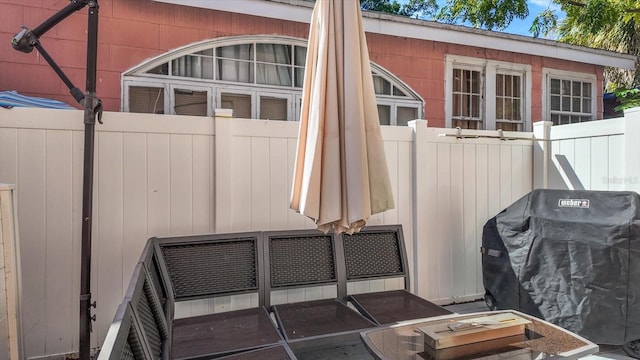 view of patio with a grill