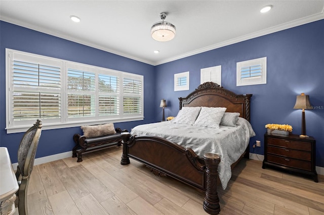 bedroom featuring ornamental molding, recessed lighting, baseboards, and wood finished floors