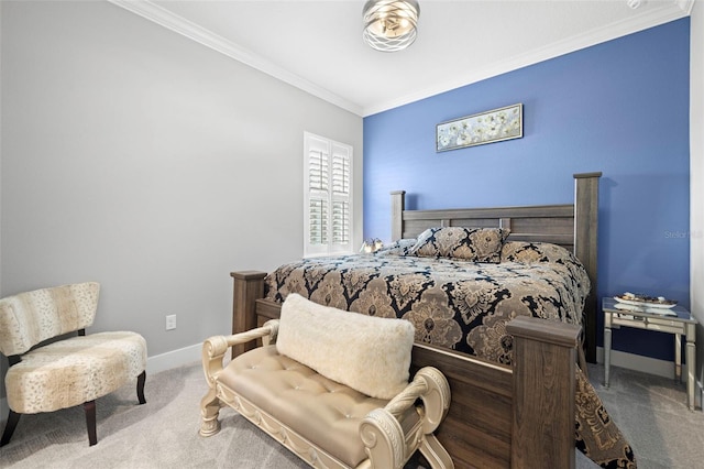 bedroom with baseboards, carpet floors, and crown molding