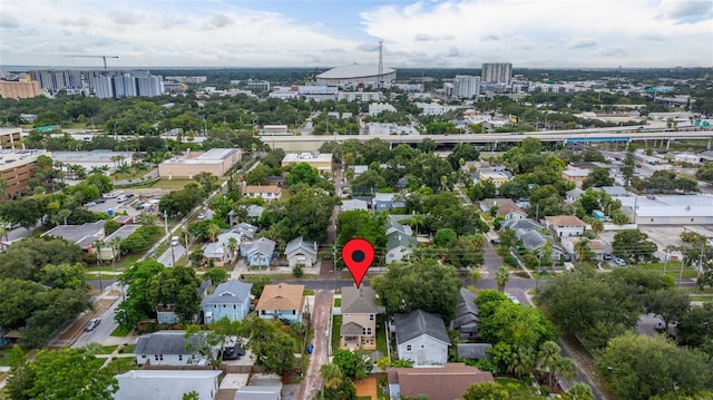 birds eye view of property with a view of city