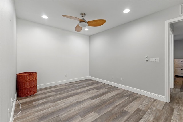 214 Cape Harbour Loop Unit 105, Bradenton, FL 34212 - unfurnished room featuring ceiling fan, wood finished floors, recessed lighting, and baseboards
