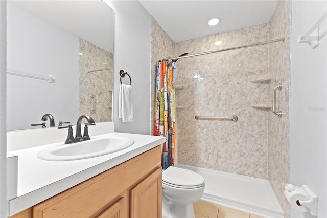 214 Cape Harbour Loop Unit 105, Bradenton, FL 34212 - bathroom featuring a shower with curtain, vanity, toilet, and tile patterned flooring