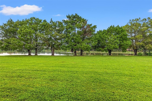 214 Cape Harbour Loop Unit 105, Bradenton, FL 34212 - view of grassy yard featuring a water view