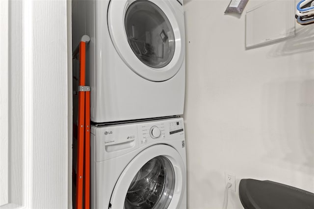 214 Cape Harbour Loop Unit 105, Bradenton, FL 34212 - laundry room featuring stacked washing machine and dryer