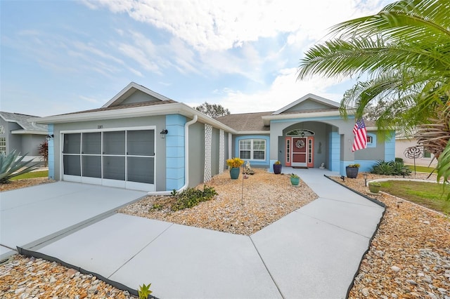 single story home with a garage