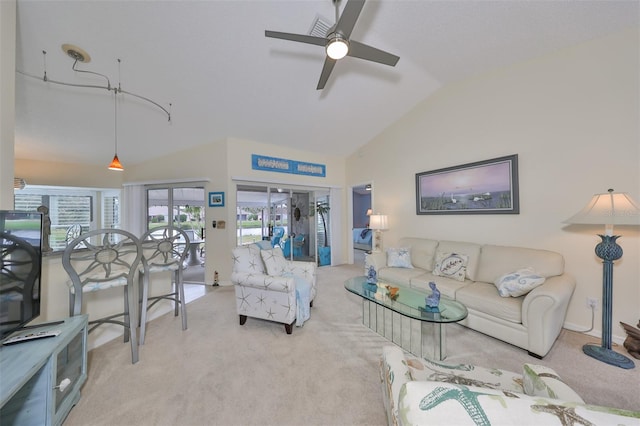 carpeted living room featuring lofted ceiling and ceiling fan