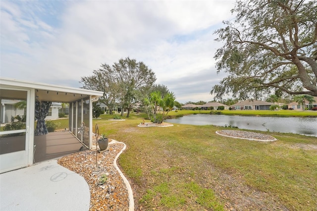 view of yard with a water view