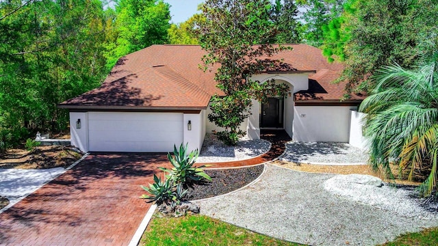 view of front of home featuring a garage