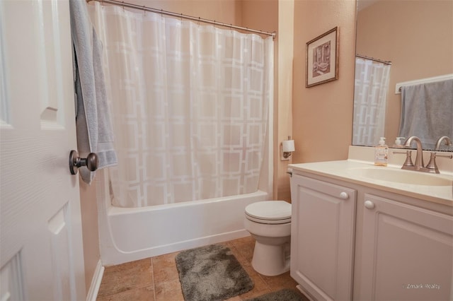 full bathroom with tile patterned flooring, vanity, toilet, and shower / bath combo with shower curtain