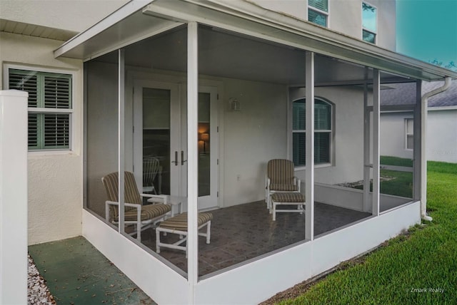 exterior space featuring a sunroom