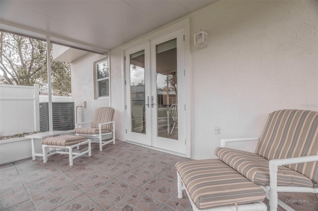 sunroom featuring french doors