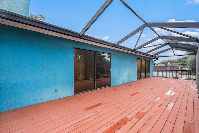 wooden deck with glass enclosure