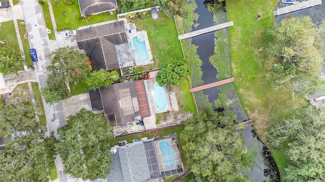 bird's eye view with a water view