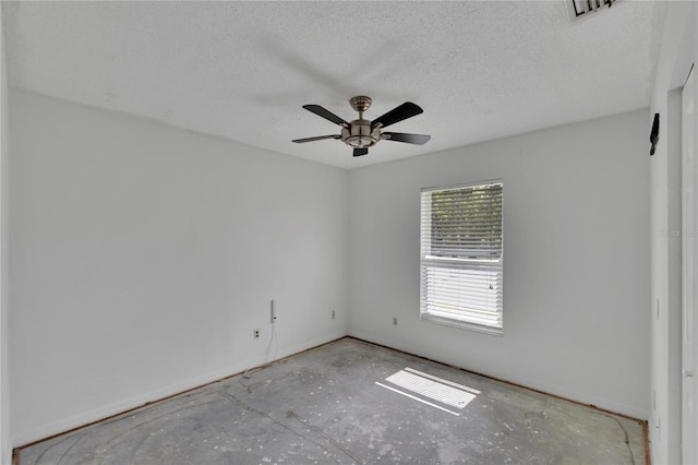 unfurnished room with a textured ceiling and ceiling fan